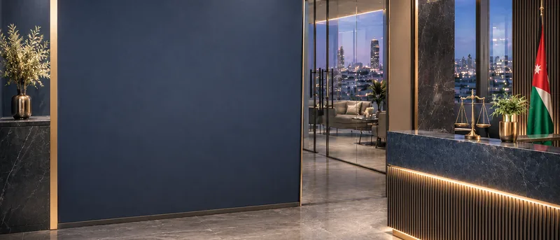 The Amman office of Abdullah & Partners at night, with a marble reception desk, brass scales of justice, the Jordanian flag, and the Amman skyline through floor-to-ceiling windows.